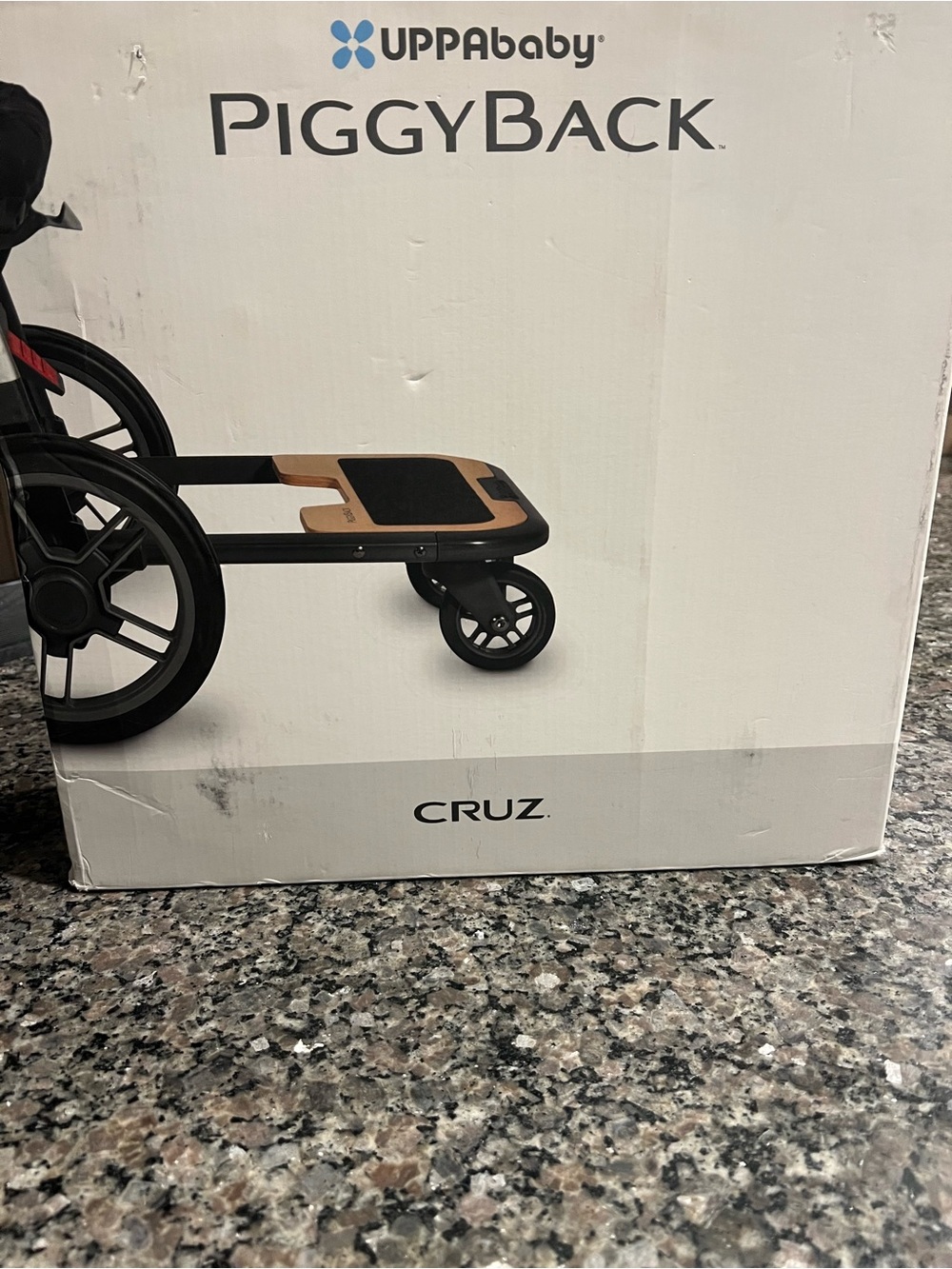 UPPAbaby PiggyBack Cruz Ride-Along Board in Black and Brown